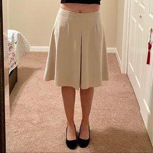 Light brown/beige knee-length A-line skirt, bought in Europe, size 4